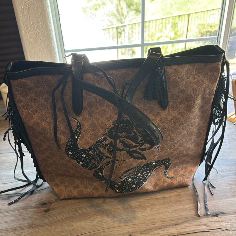 Large tassel Coach tote